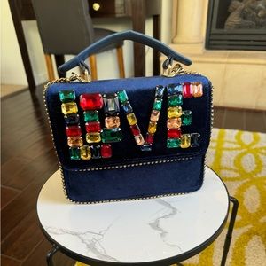 LOVE bag never worn. Velvet blue with shoulder chain
